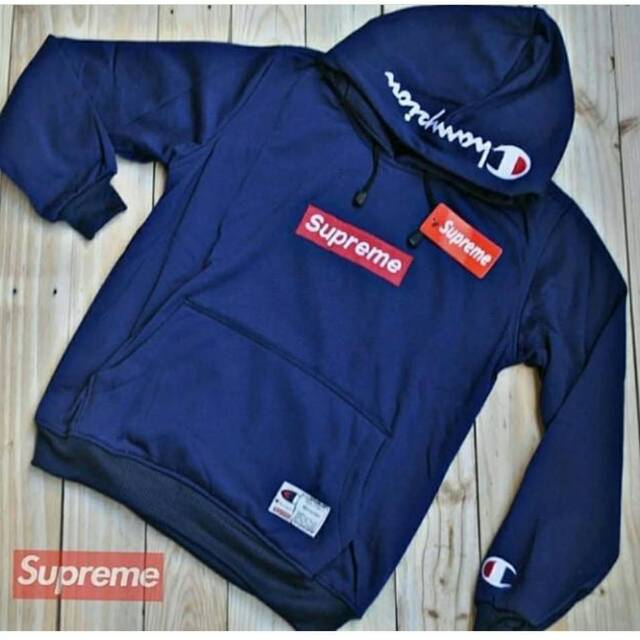 harga hoodie supreme x champion original