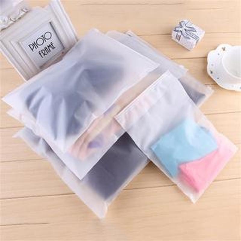 Tas Penyimpanan Pakaian / Celana / Kaos T-Shirt Transparan Frosted Anti Air / Debu Reusable Untuk Travel