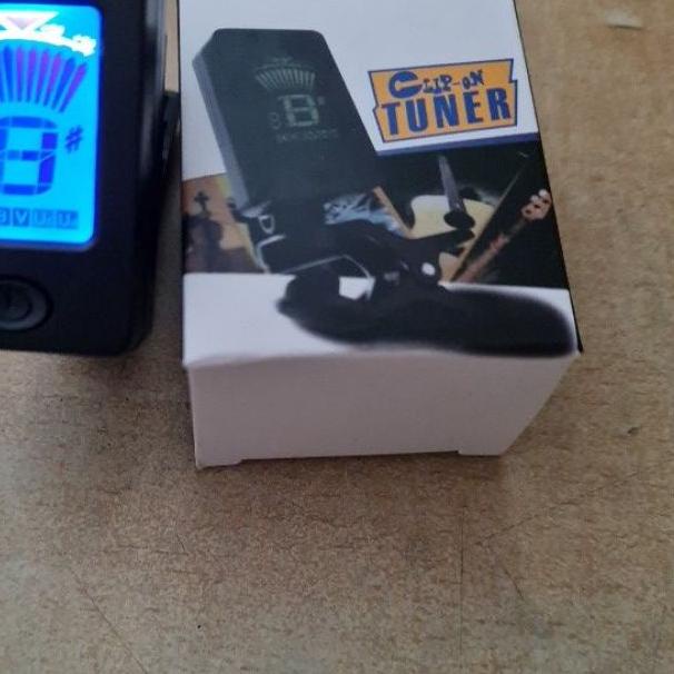 tuner gitar jepit atau alat penyetel gitar