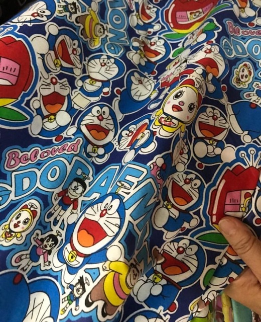 KATUN PIYAMA MOTIF TSUMTSUM DORAEMON KARTUN