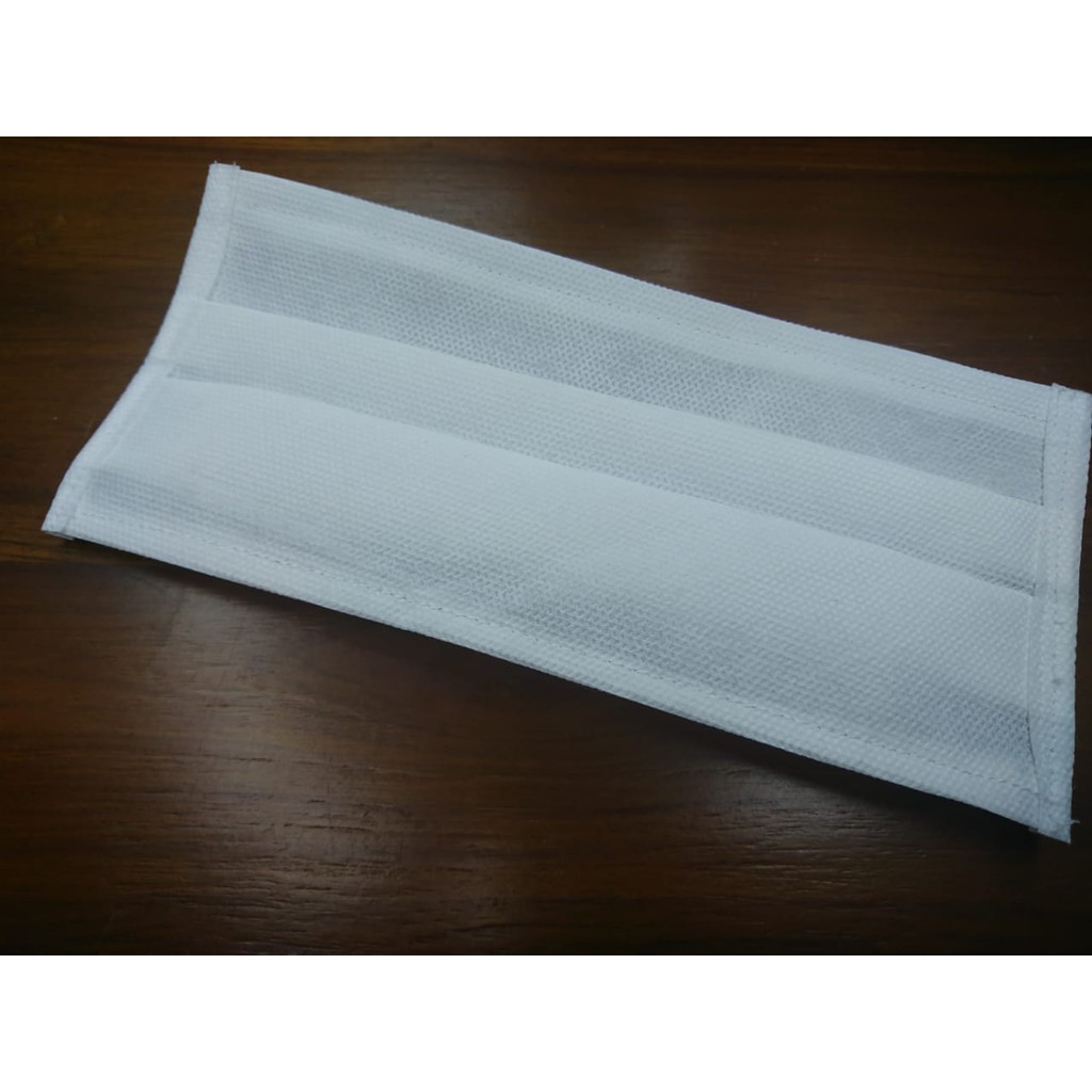 

ISI 12 PCS | MASKER KAIN SPUNBOND 1 LAPIS | BAHAN 75GSM
