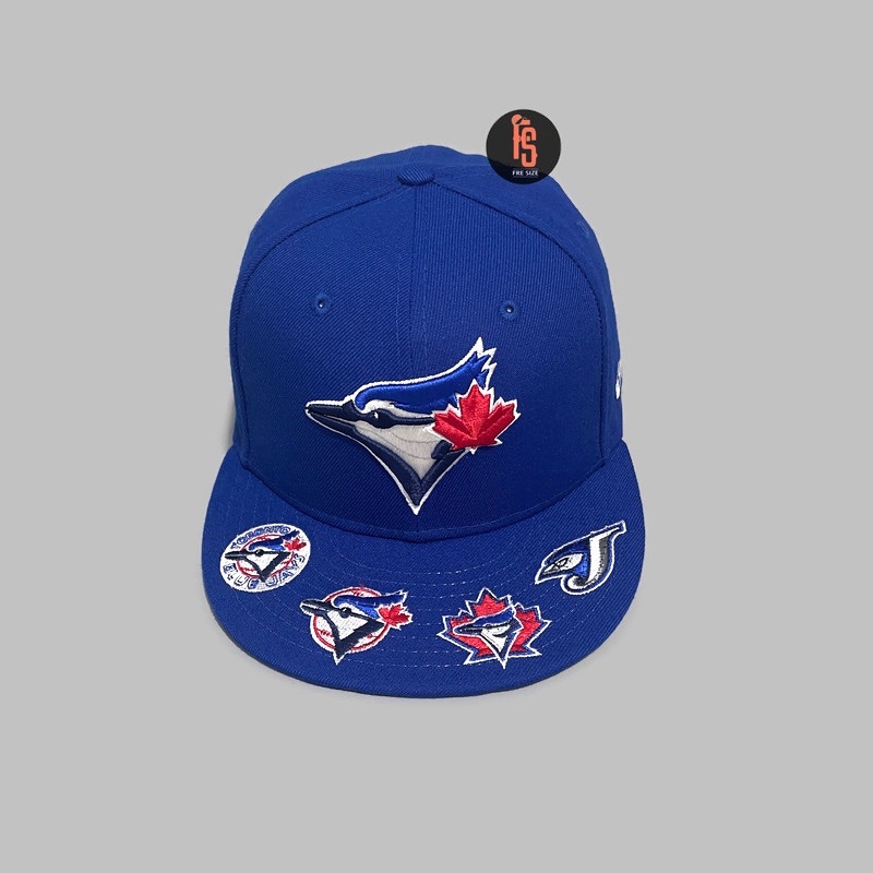 TOPI NEW ERA ORIGINAL 5950 GRAPHIC VISOR TORONTO BLUE JAYS BLUE UV GREEN