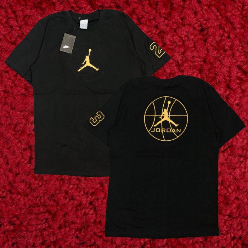 gold and black jordan shirt