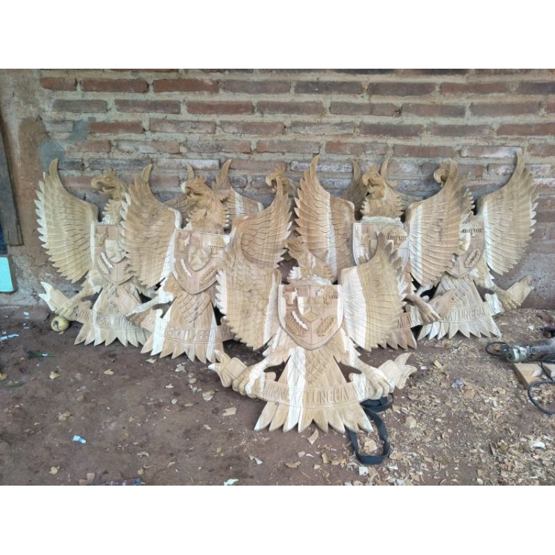 ukiran burung garuda mentahan dari bahan kayu jati murah