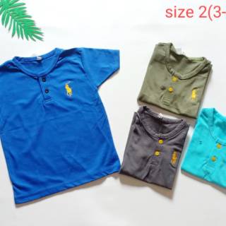  Kaos polo kancing anak  Shopee Indonesia