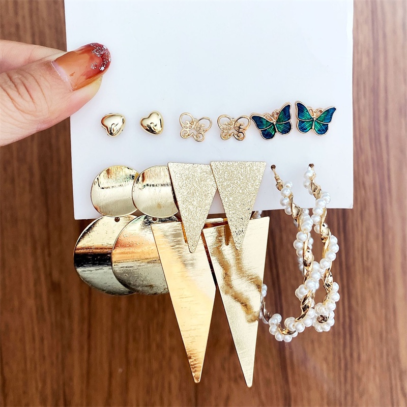 Set Anting Tusuk Bentuk Hati / Kupu-Kupu / Bulat / Segitiga Warna Emas Untuk Wanita