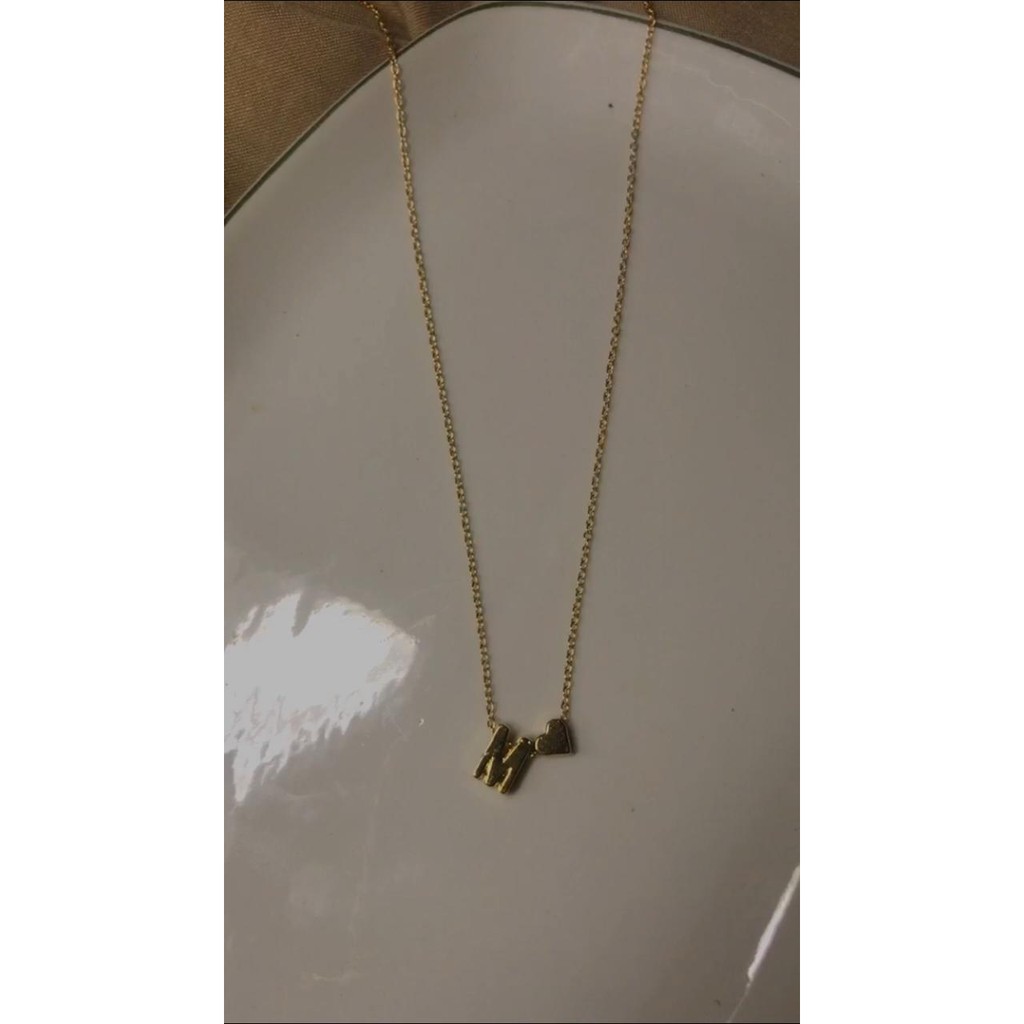 Kalung huruf M