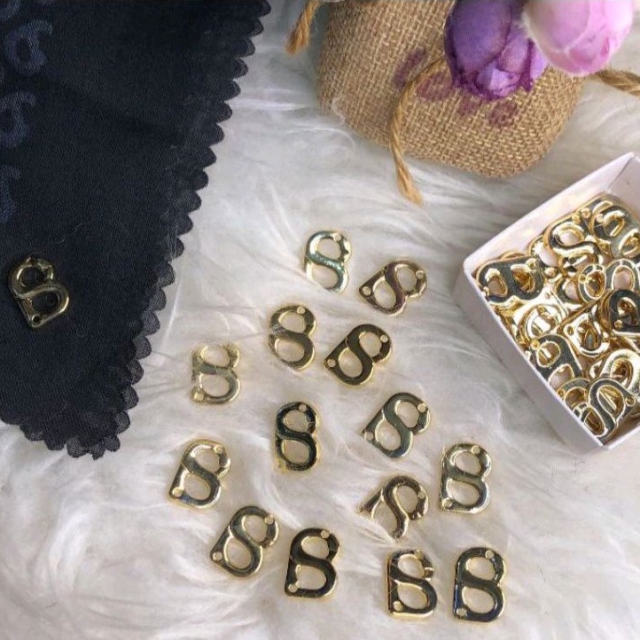 label hijab buttonscarves/ pin jahit /plat hijab buttonscarves /plat hijab branded