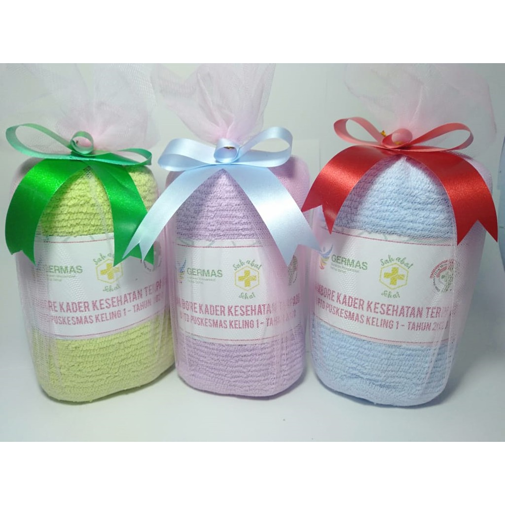 

Souvenir Handuk 30 x 70cm Label + Packing Tile + Pita