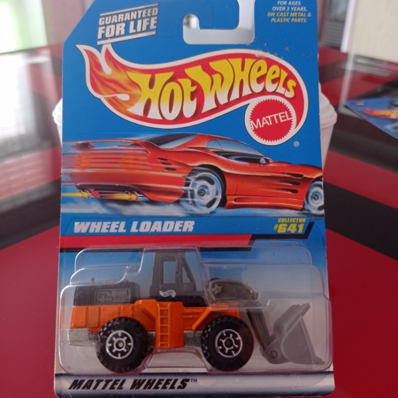 Hot Wheels Wheel Loader Orange Hitam