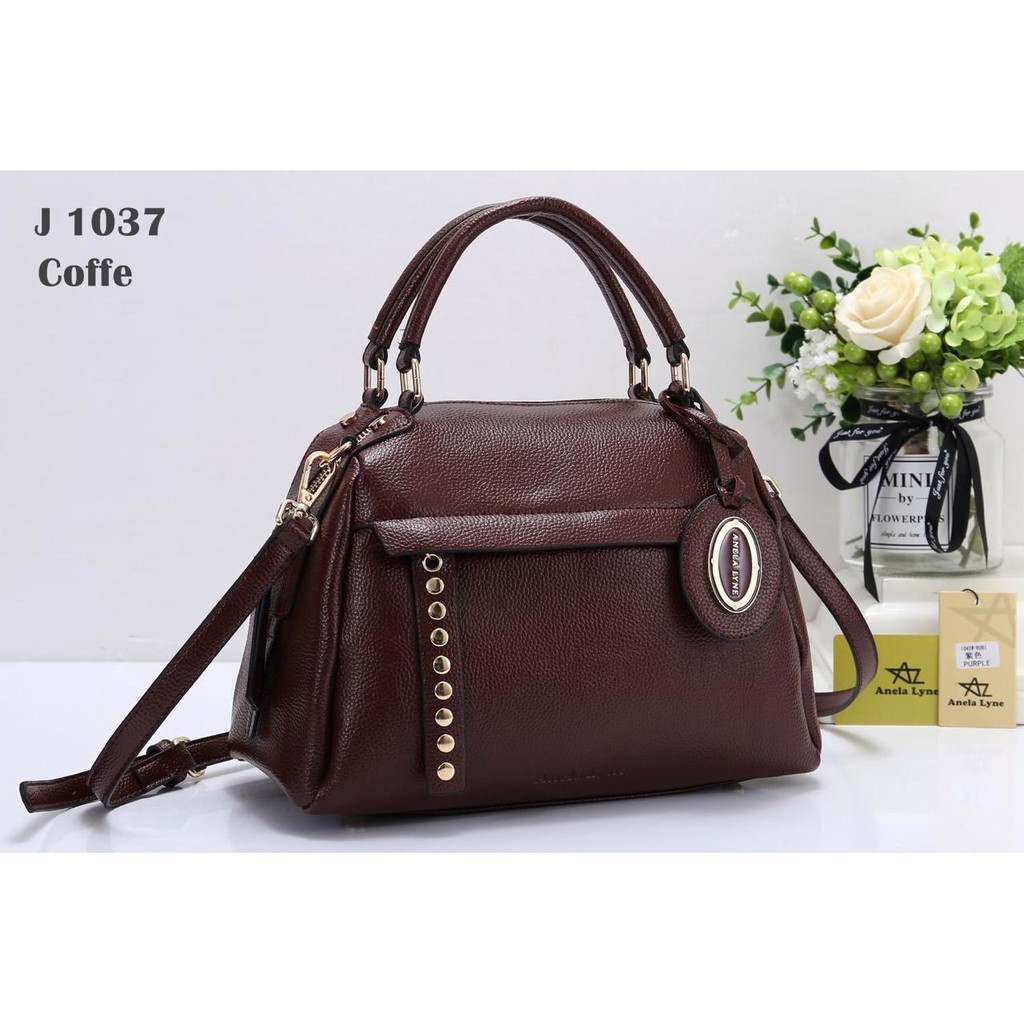 Tas anela lyne B064