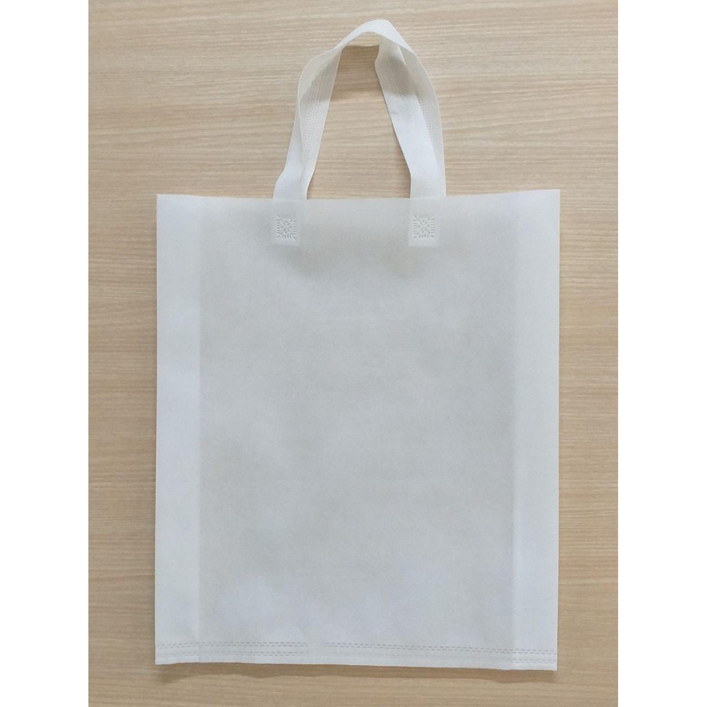 Jual GOODIE BAG SPUNBOND HANDLE 38x45 Tas Belanja Murah Kantong 