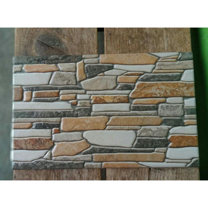 keramik dinding batu alam 25x40
