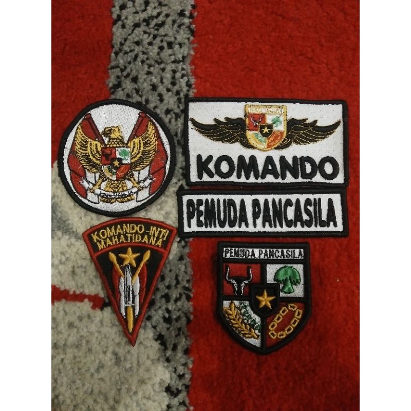 atribut timbul pemuda pancasila