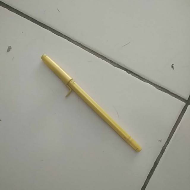 

Pulpen kuning bekas