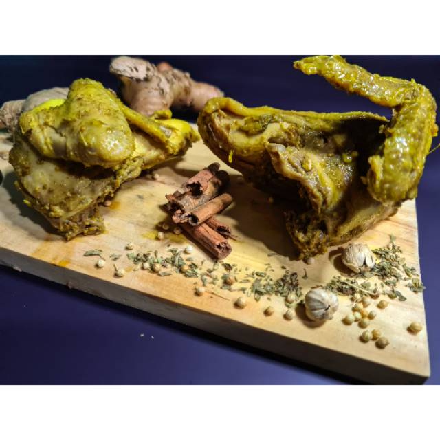

Dada Ayam bumbu kuning rempah