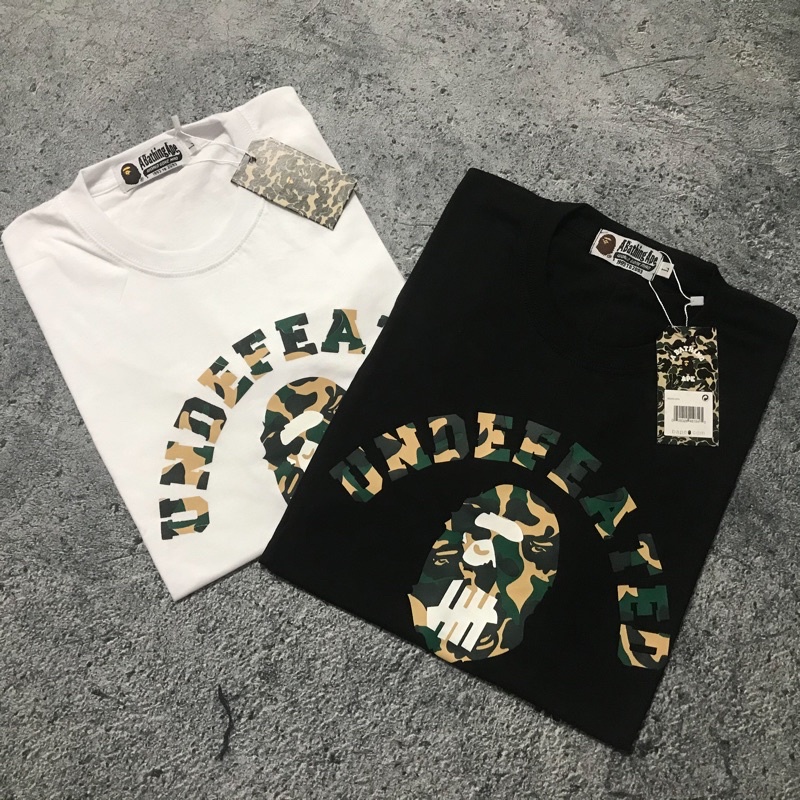 KAOS BAPE X UNDEFEATED CAMO - BAJU TSHIRT A BATHNG APE CAMO MIRROR 1:1 ORIGINAL TERMURAH