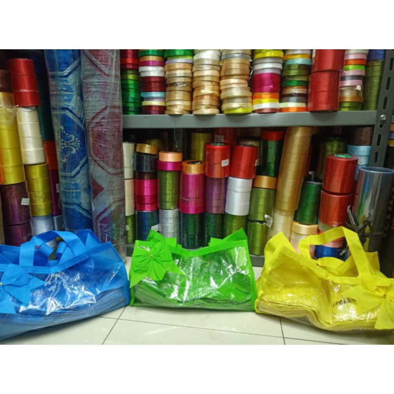 

tas spunbond mika new buat bronis dan bolu 30 isi 12 pcs