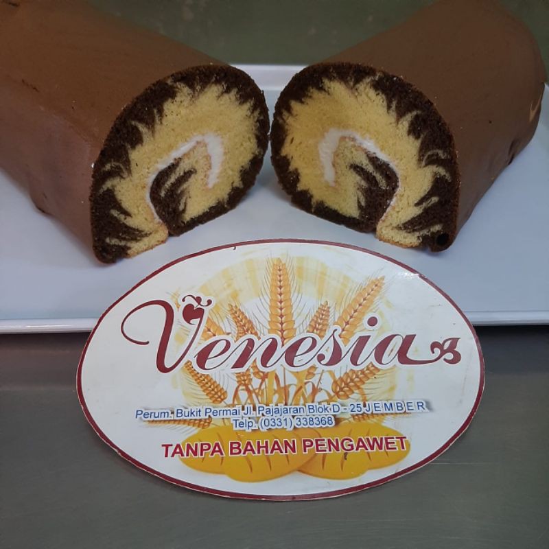 

Bolu Gulung Huricane - Vanilla Coklat