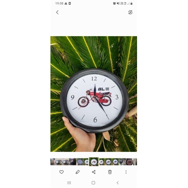 jam dinding penhias ruang tamu