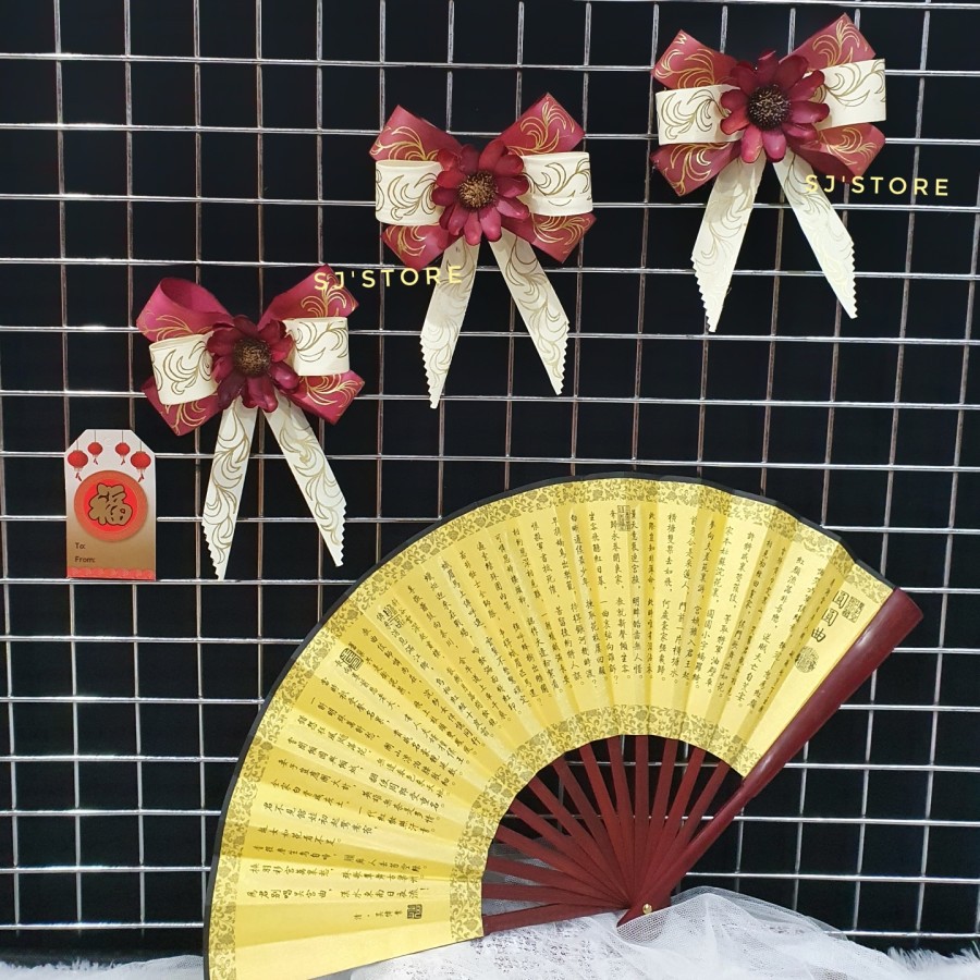 

Aksesoris Hampers Imlek Pita Maroon Putih