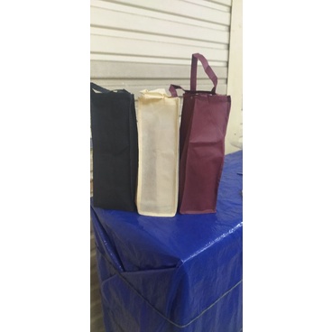 

tas spunbond kain botol bisa buat winne isi 12 pcs terlaris