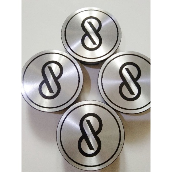 Dop center velg logo Enkei tulisan hitam. Variasi datar silver. Diameter 6 cm