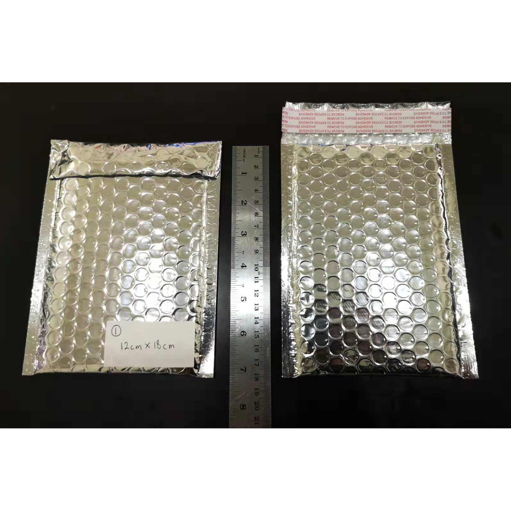

Amplop Premium Packaging Mailer Bubble Wrap silver Black 12cm*18cm (1)
