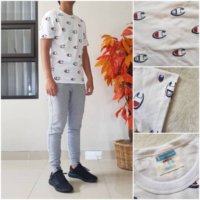 KAOS PRIA CHAMPION FULL PRINT LOGO