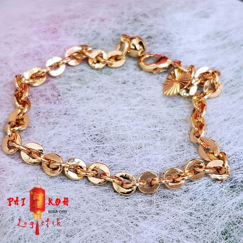 Gelang tangan Nuri titanium Gold