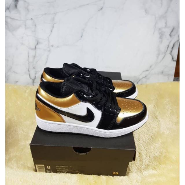 Nike air jordan 1 retro low black gold