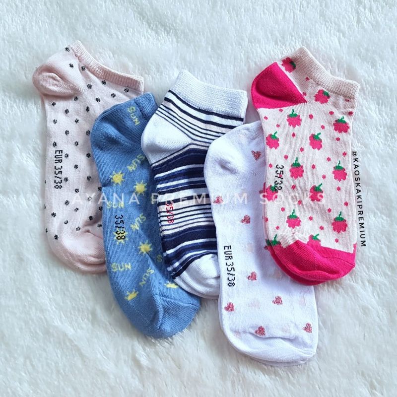 Kaos kaki mata kaki motif selusin
