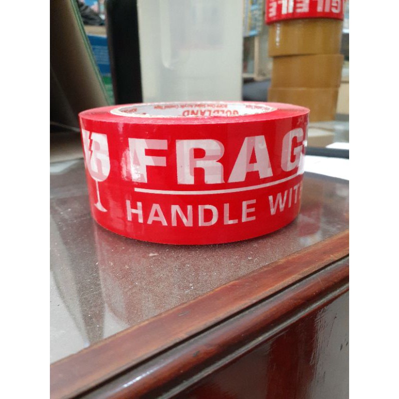 

Lakban Fragile Merah