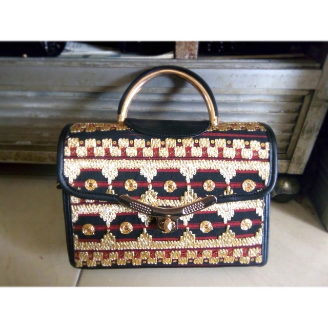 Tas jinjing tapis