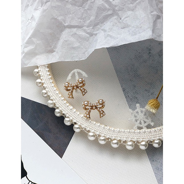 LRC Anting Tusuk Fashion Bow Pearl-studded Earrings D27867