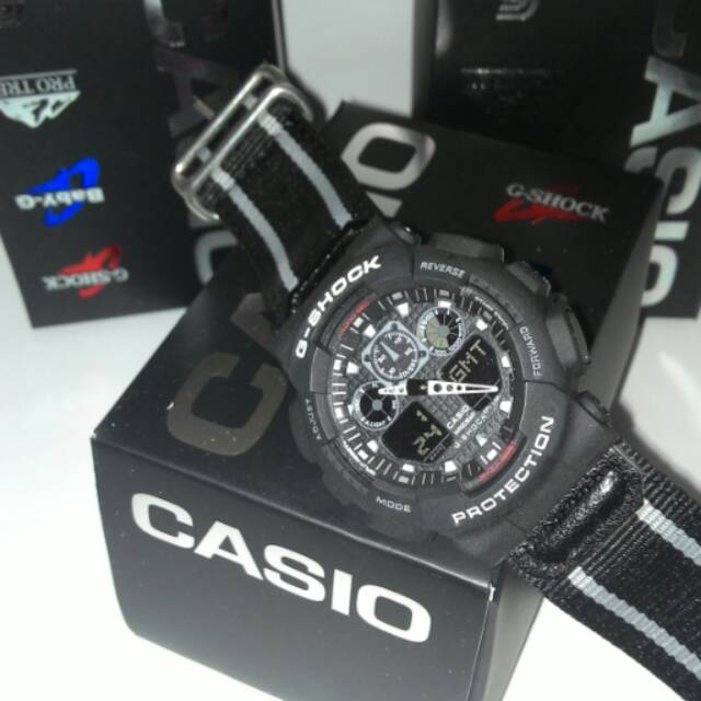 Jam tangan pria Casio G-Shock GA100 strap/tali kanvas hitam Kws