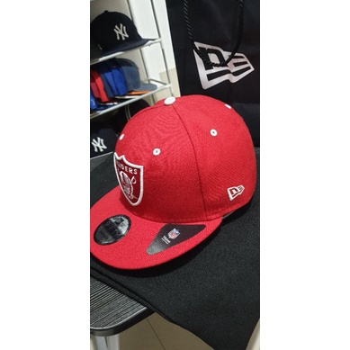 topi raiders merah newera original