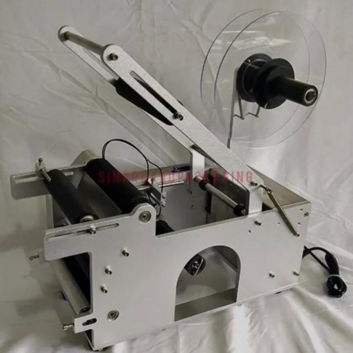 

Mesin Labeling Stiker Label Botol Bulat Mt-50 Semiotomatis