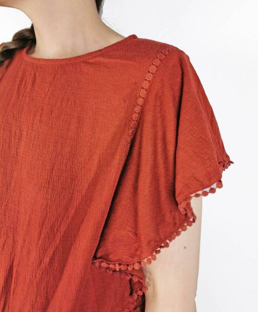 K rose spice orange ruffled top