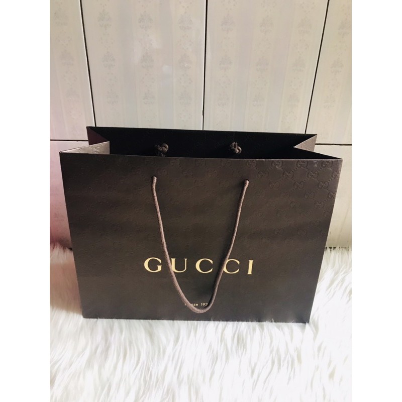 

paper bag gucci original store