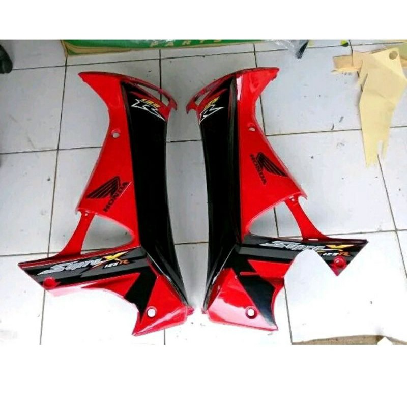 Cover sayap depan supra x 125 lama merah hitam