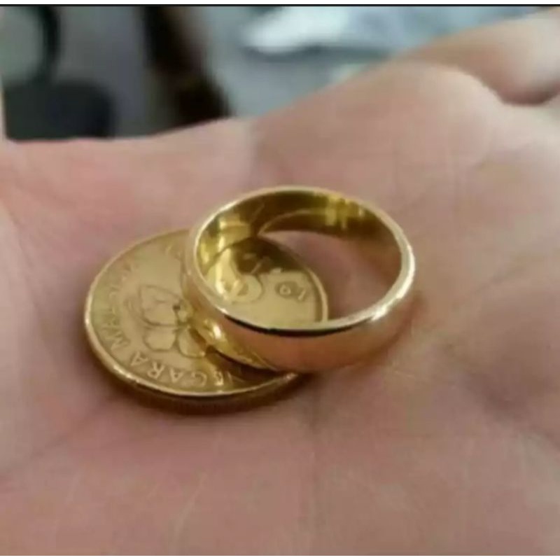 cincin koin asli terbuat dari uang logam kuningan