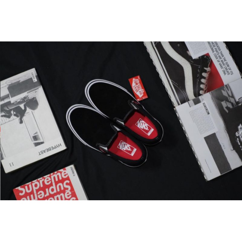 vans slip on pro black white
