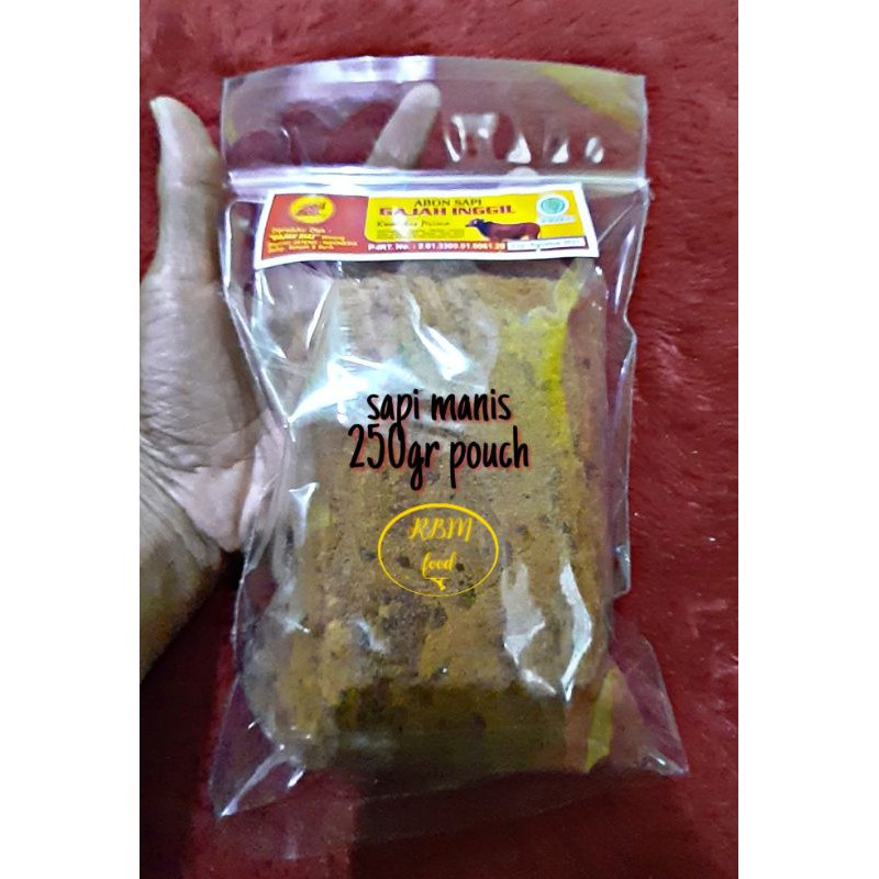 

Abon Sapi Manis dan pedas non MSG kemasan Pouch 250 Gram cap Gajah Inggil
