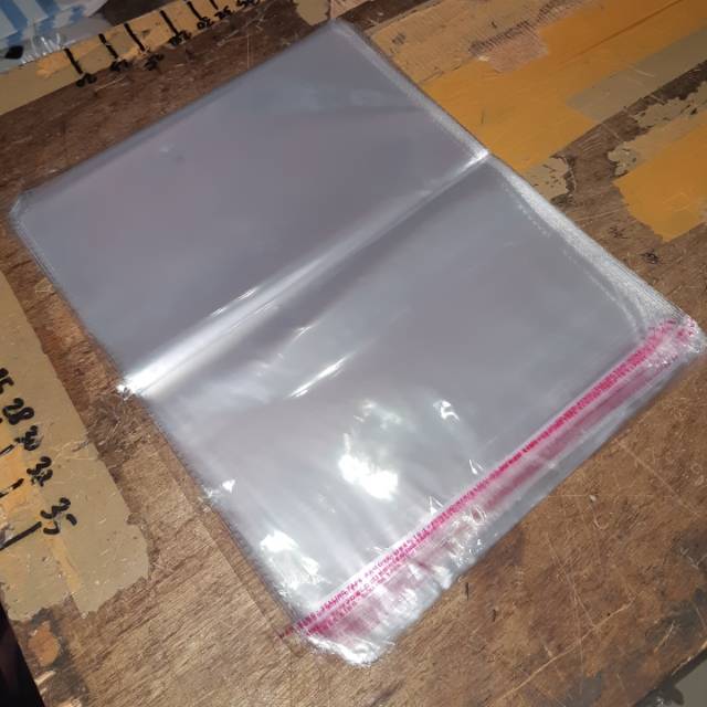 

100 LEMBAR Plastik OPP lem 25 x 35 cm 04 (plastik lem seal king)