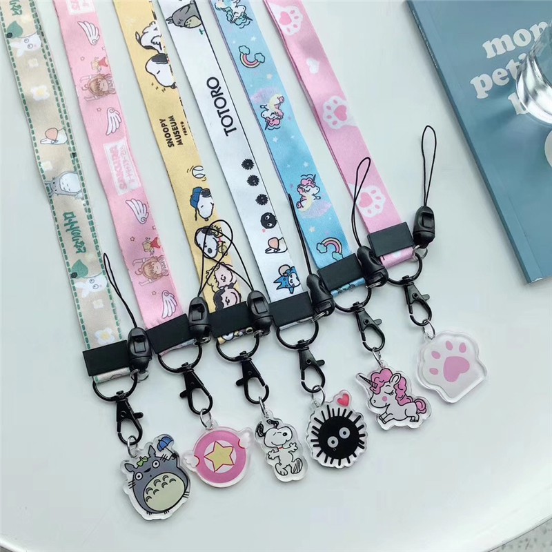 A Cartoon Pendant + A Nylon lanyard can be used as a Phone ID Badge Camera band