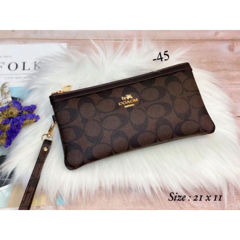 fashion branded dompet panjang,pouch hpo motif coach 2072