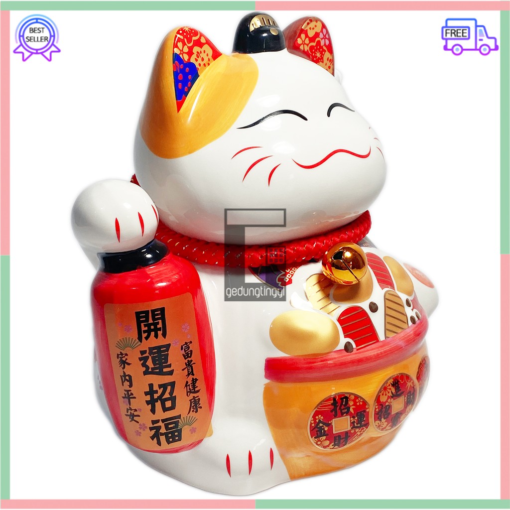 Pajangan Patung Hiasan Boneka Dekorasi Kucing Bawa Panggil Rejeki Rezeki Hoki Maneki Neko Maneko Neki ManekiNeko Lucky Cat Keberuntungan Keramik Putih Baterai Batrai Batre Listrik Tangan Goyang Gerak Meja Etalase Toko Resto Cafe Cina China Jepang Jumbo XL