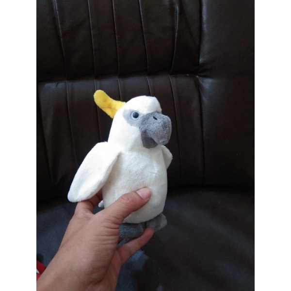 boneka burung kakak tua