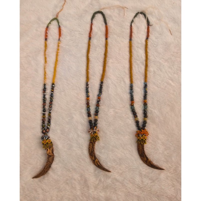 Kalung Taring Babi Fake Ukir Dayak